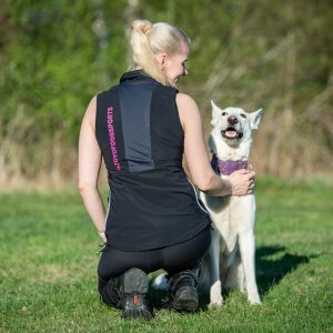backside of the pink ProTrainer training vest for dog sports